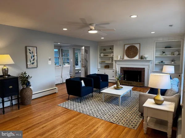 a kitchen with stainless steel appliances granite countertop a refrigerator stove microwave and sink