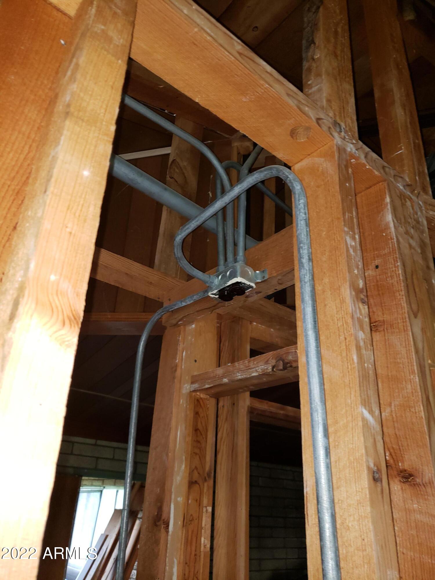 306 Rolling Hills Road Young, AZ 85554 - Photo 12 of 42 Elec conduit on wood studs