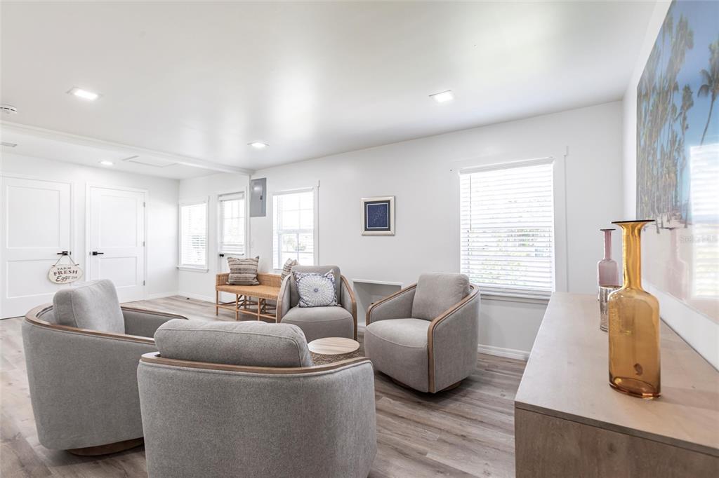 640 Broadway Street Longboat Key, FL 34228 - Photo 3 of 26 a living room with furniture and a window