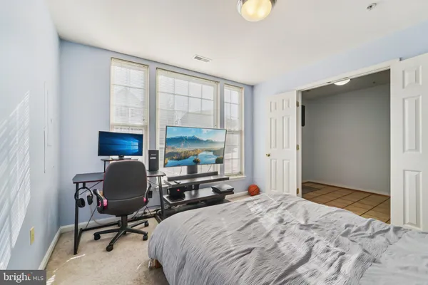 a workspace with furniture and a window