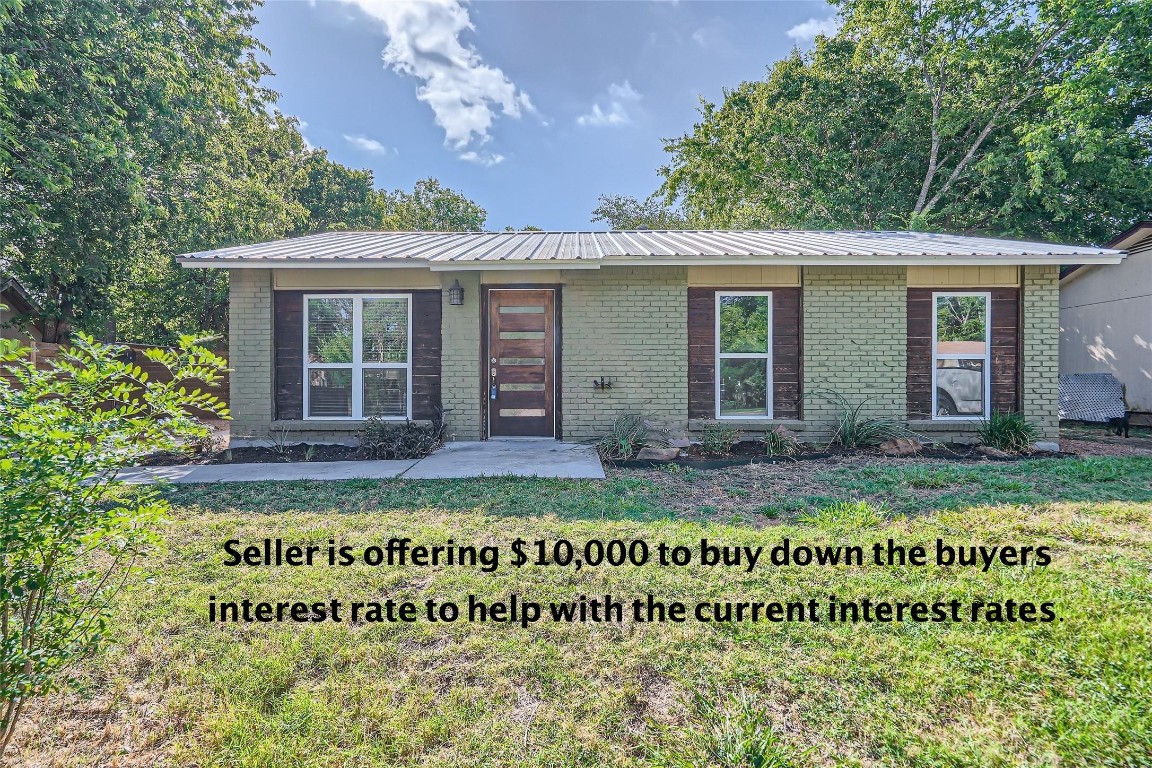 6035 Bluebell Circle Austin, TX 78741 - Photo 1 of 1 a view of a house with a garden