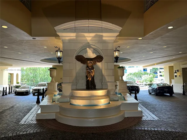 a view of lobby with gym equipment