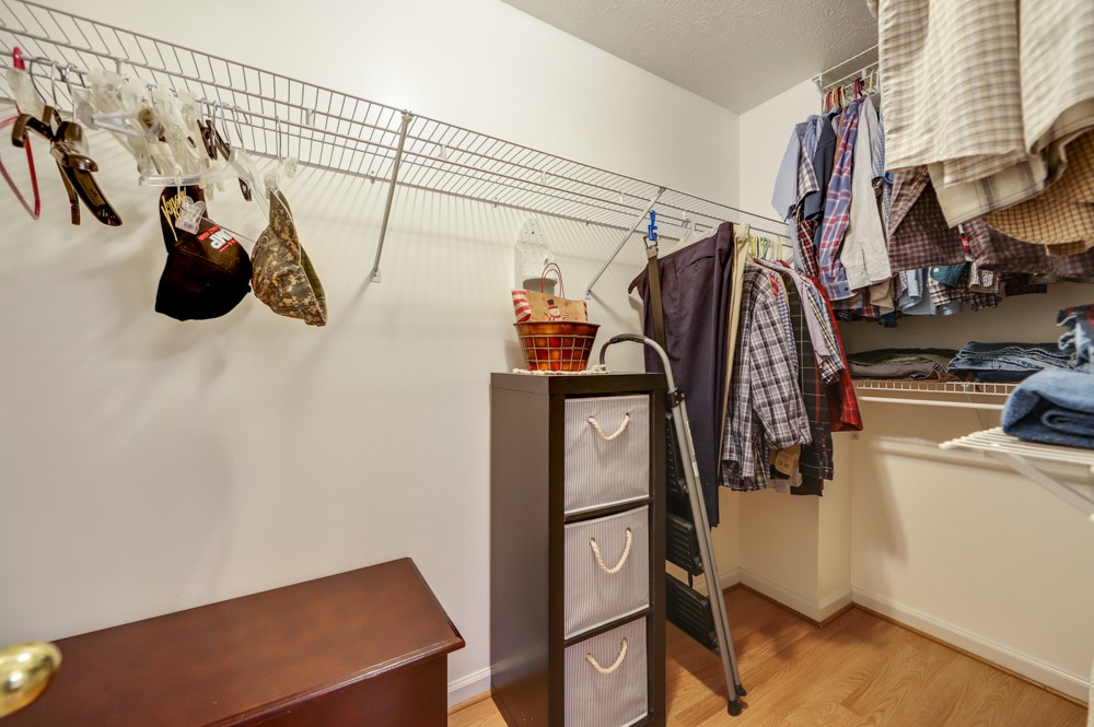 1303 Abiff Road Bon Aqua, TN 37025 - Photo 23 of 50 a view of walk in closet with clothes and shoes