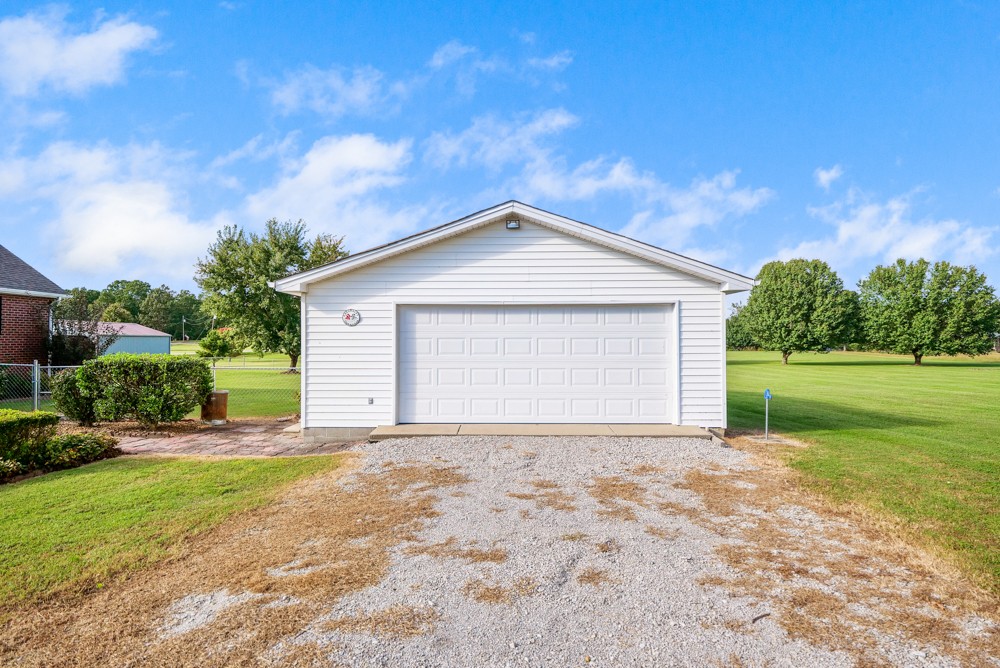 1303 Abiff Road Bon Aqua, TN 37025 - Photo 36 of 50 a front view of a house with garden