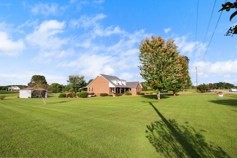 1303 Abiff Road Bon Aqua, TN 37025 - Photo 5 of 50 a view of a house with a big yard