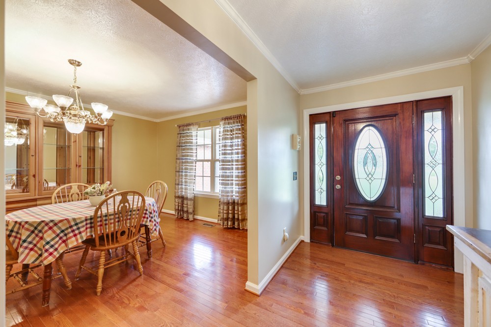 1303 Abiff Road Bon Aqua, TN 37025 - Photo 8 of 50 a view of a a dining room with furniture window and wooden floor