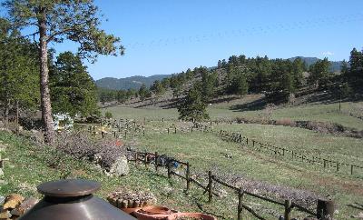 1992 Swede Gulch Road Golden, CO 80439 - Photo 1 of 1 a view of a lake with mountain view