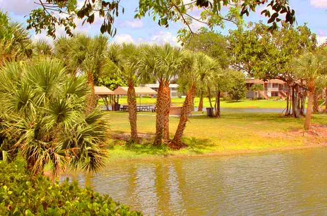 a large room with lots of furniture and clutter