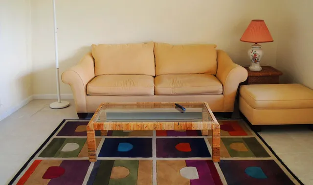 a balcony with a rug