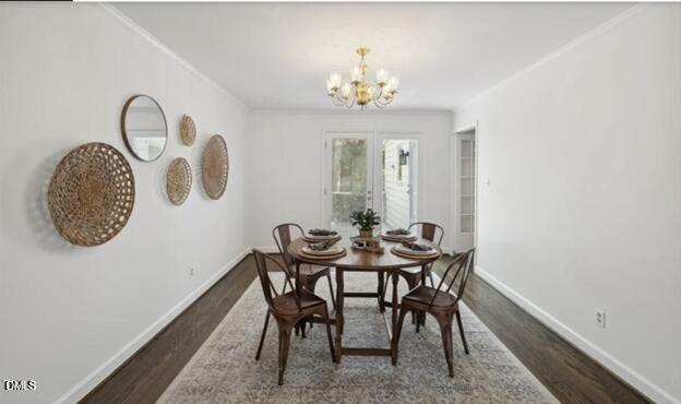 3317 Harden Road Raleigh, NC 27607 - Photo 10 of 52 a view of a dining room with furniture and chandelier