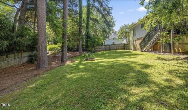 3317 Harden Road Raleigh, NC 27607 - Photo 40 of 52 a fire hydrant in the middle of a field