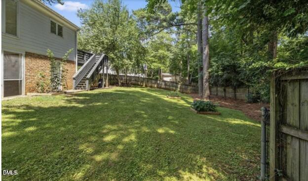 3317 Harden Road Raleigh, NC 27607 - Photo 42 of 52 a view of a house with backyard and sitting area