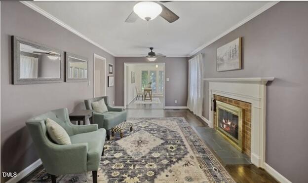 3317 Harden Road Raleigh, NC 27607 - Photo 4 of 52 a living room with furniture and a fireplace