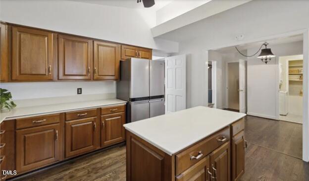3317 Harden Road Raleigh, NC 27607 - Photo 7 of 52 a kitchen with a refrigerator sink and cabinets