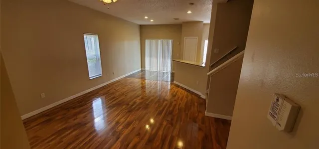 a view of entryway with wooden floor