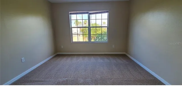 an empty room with a window