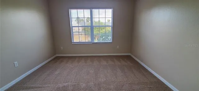 an empty room with a window