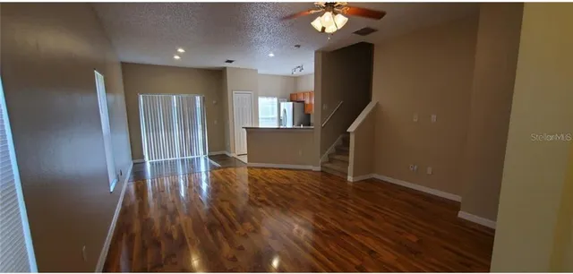 a view of entryway with wooden floor