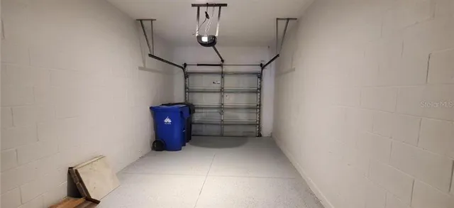 a sign that is on a brick wall