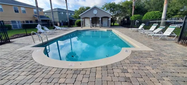 a view of a house with a swimming pool