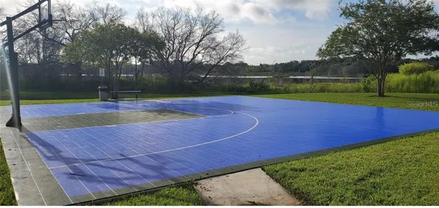 a view of outdoor space and tennis court