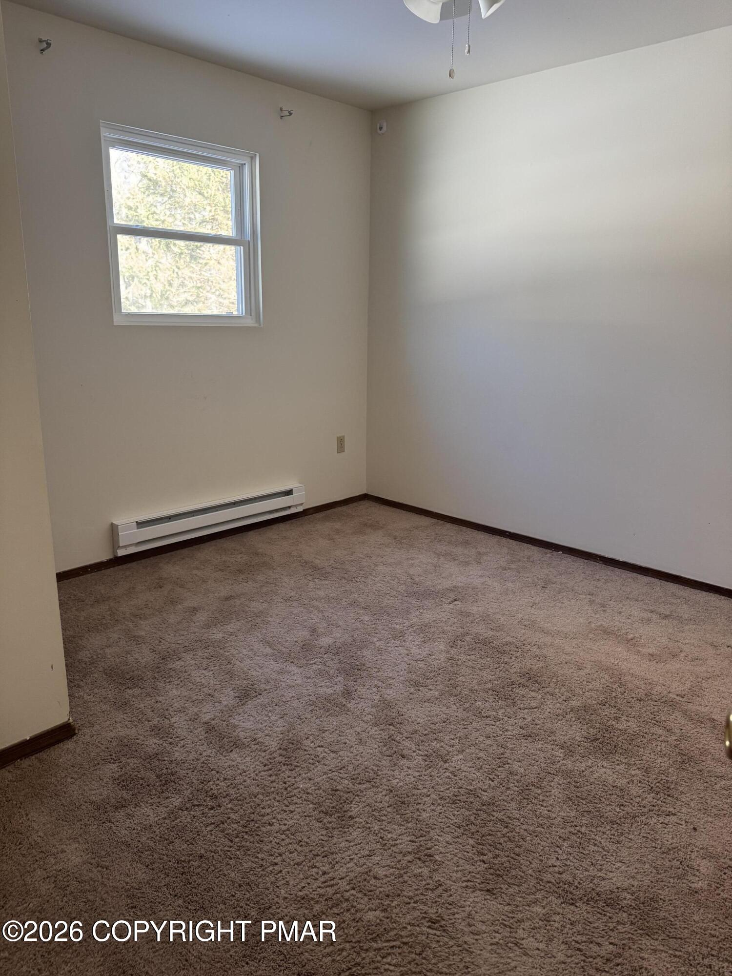 217 Coach Road Tobyhanna, PA 18466 - Photo 20 of 28 an empty room with a window