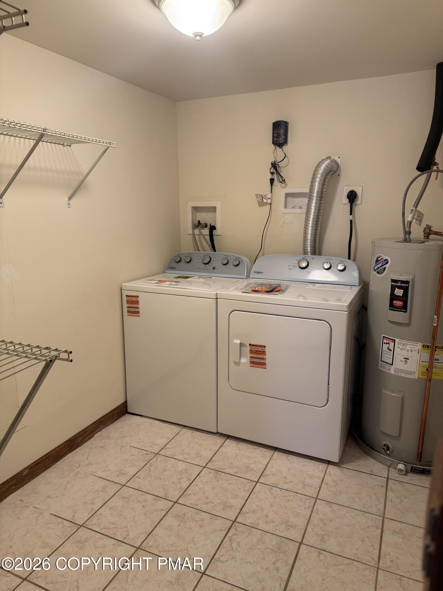 217 Coach Road Tobyhanna, PA 18466 - Photo 8 of 28 a utility room with dryer and washer