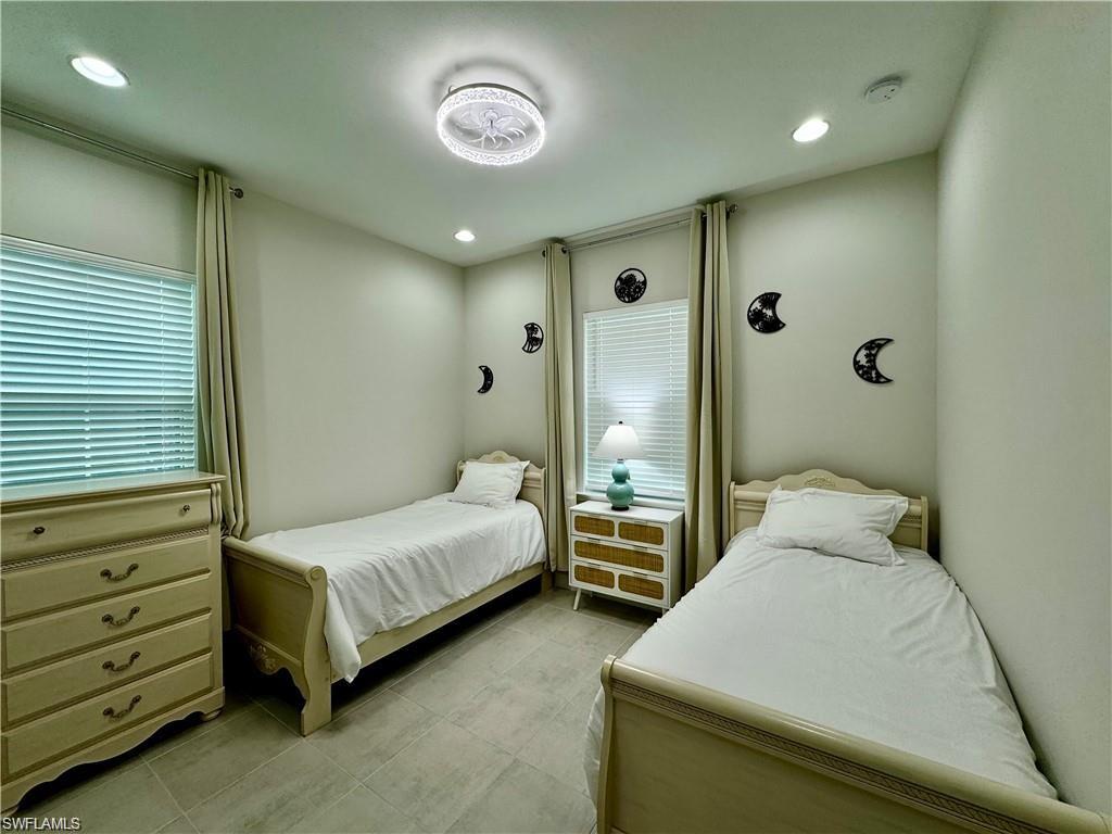 7135 Cayo Coco Lane Naples, FL 34113 - Photo 20 of 41 Bedroom with recessed lighting
