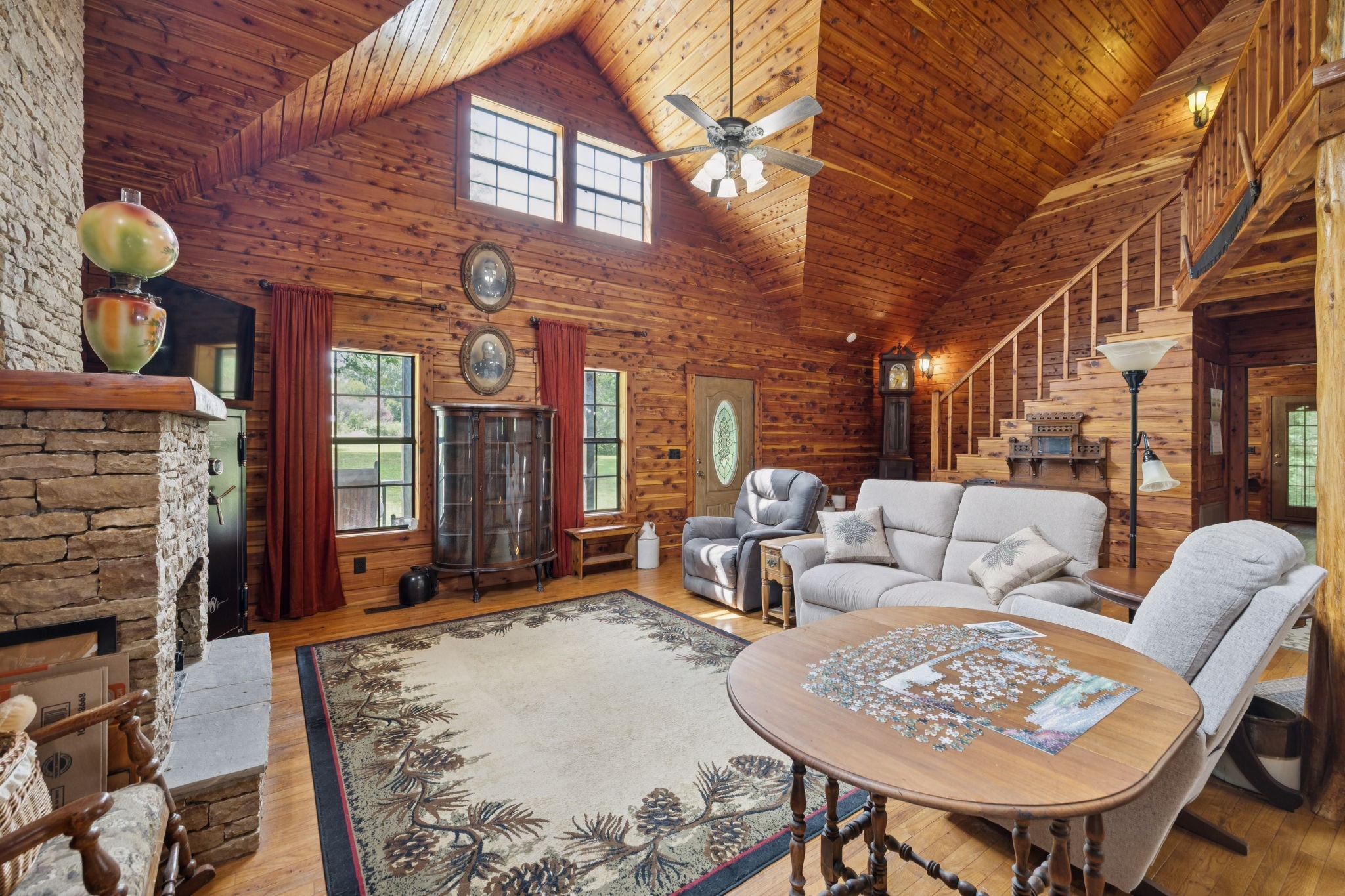 602 Gaither Hinson Road Waynesboro, TN 38485 - Photo 17 of 69 a living room with fireplace furniture and a rug