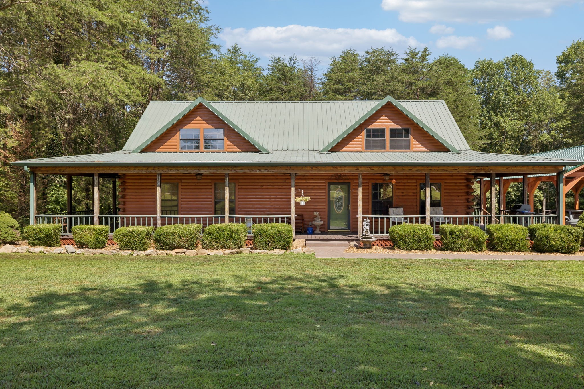 602 Gaither Hinson Road Waynesboro, TN 38485 - Photo 2 of 69 a front view of a house with a yard