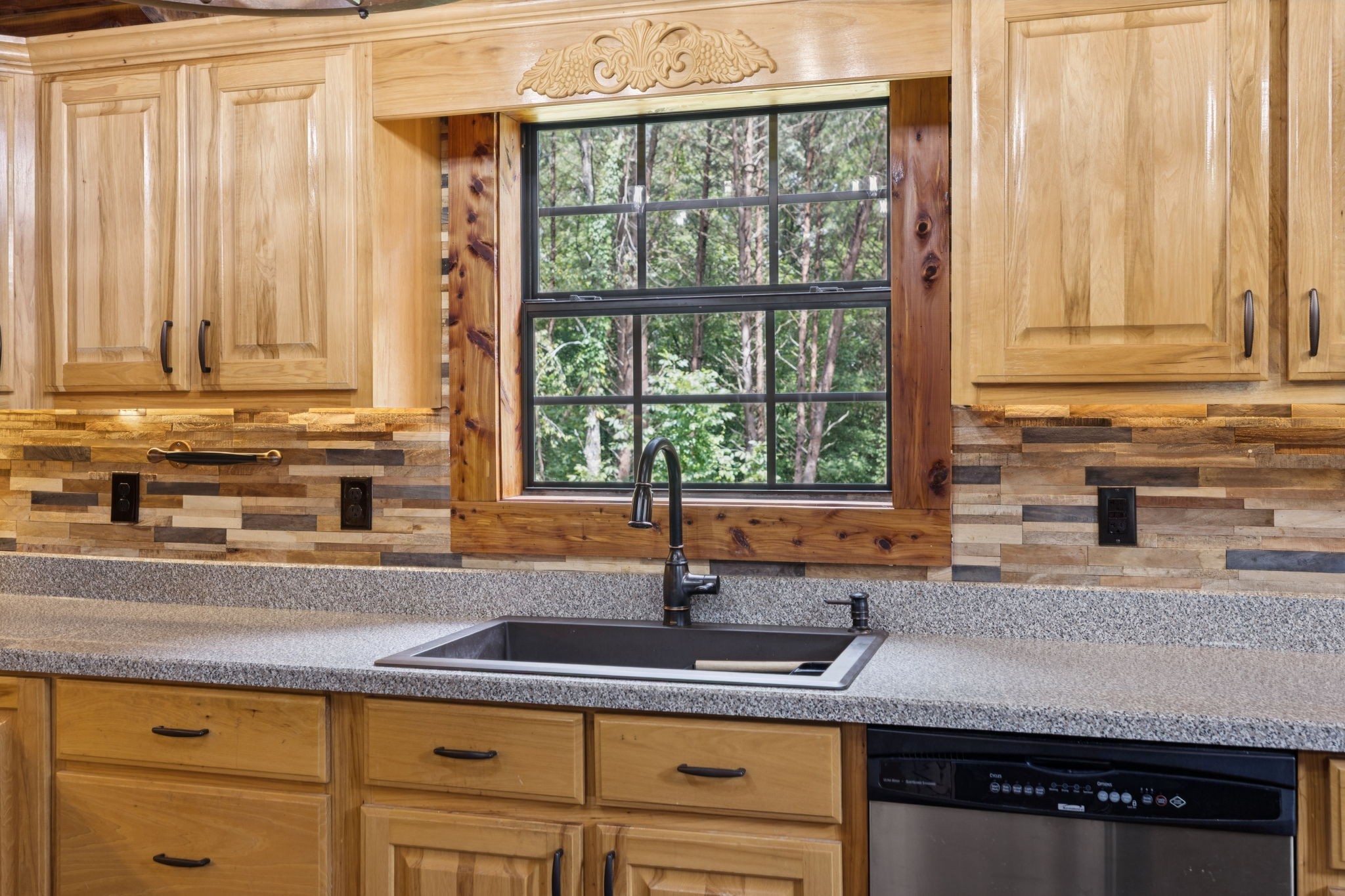 602 Gaither Hinson Road Waynesboro, TN 38485 - Photo 25 of 69 a kitchen with stainless steel appliances granite countertop a sink a window and a counter space