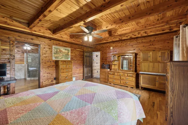 a view of a balcony with wooden floor
