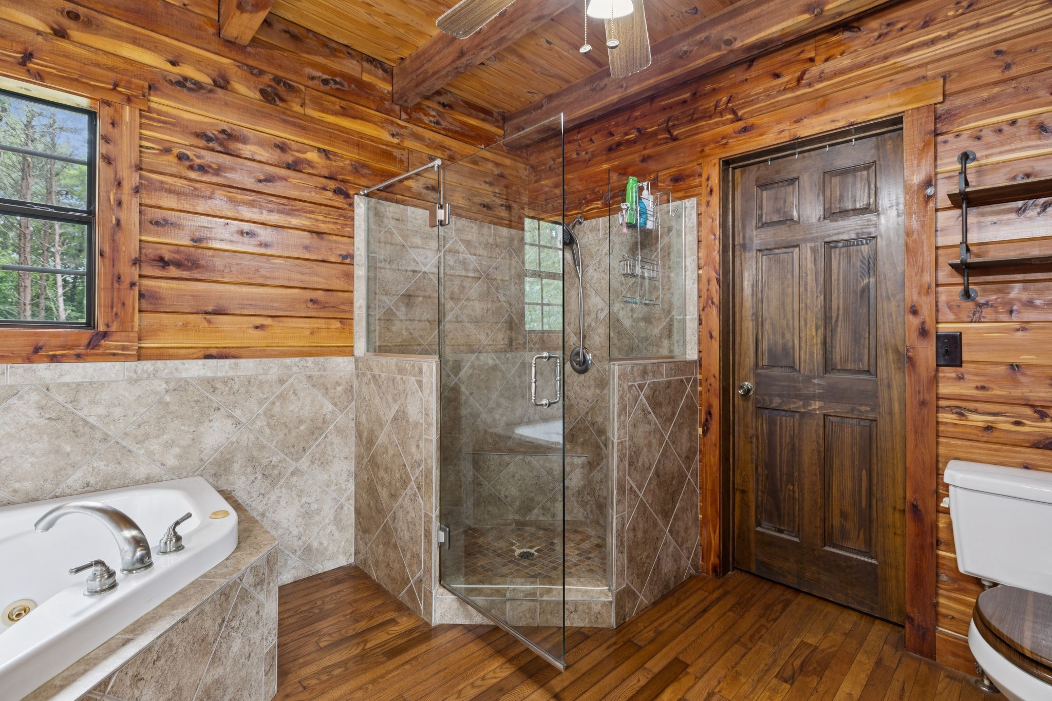 602 Gaither Hinson Road Waynesboro, TN 38485 - Photo 33 of 69 a bathroom with a bathtub and shower
