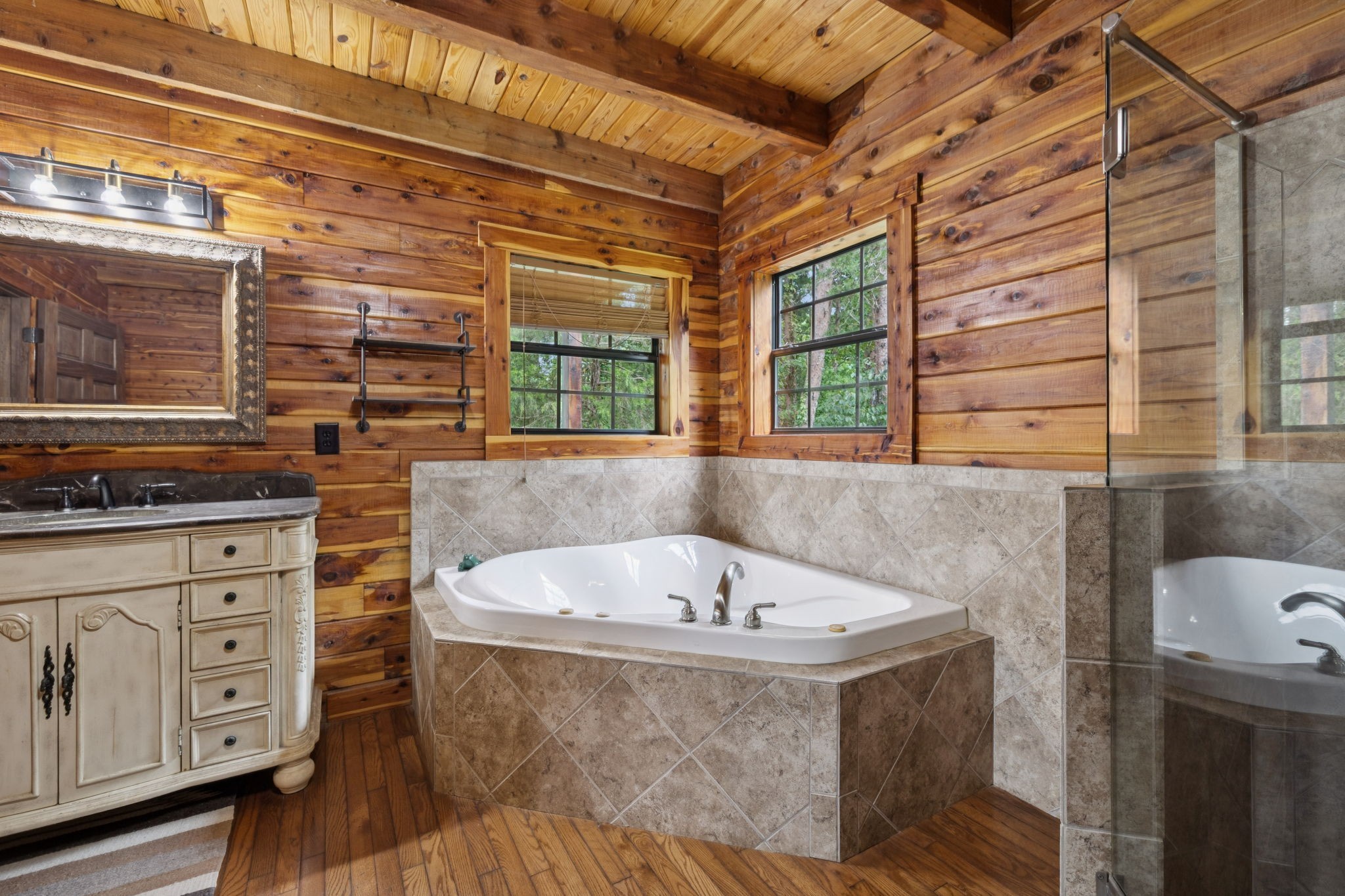 602 Gaither Hinson Road Waynesboro, TN 38485 - Photo 35 of 69 a bath tub sitting in a bathroom next to a window