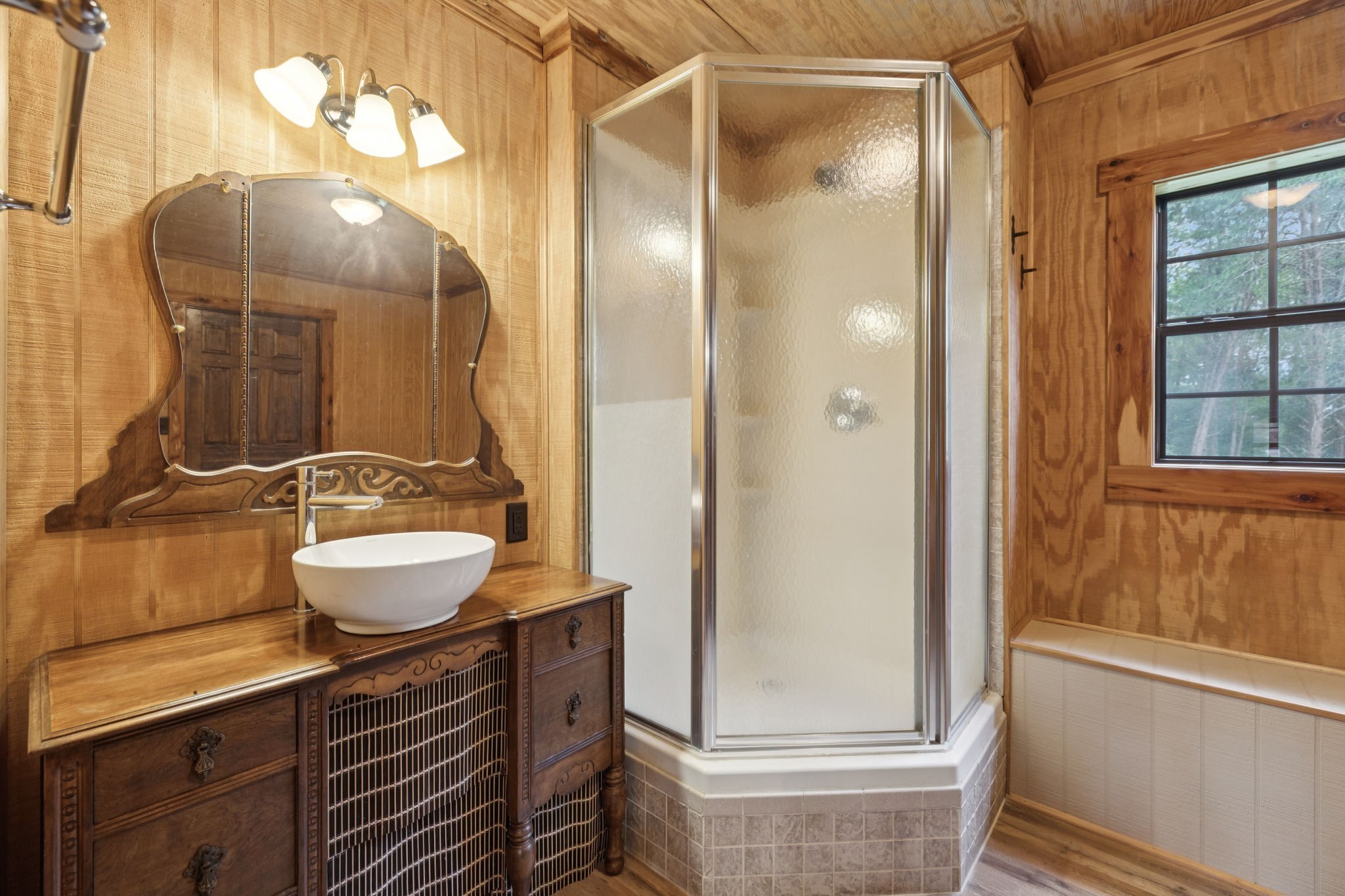 602 Gaither Hinson Road Waynesboro, TN 38485 - Photo 41 of 69 a bathroom with a sink a toilet and shower