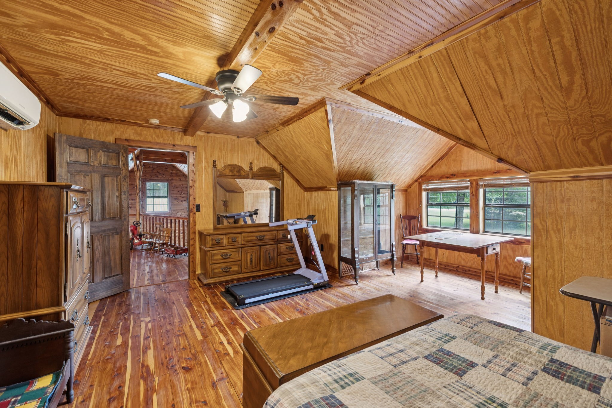 602 Gaither Hinson Road Waynesboro, TN 38485 - Photo 43 of 69 a living room with furniture a flat screen tv and a table