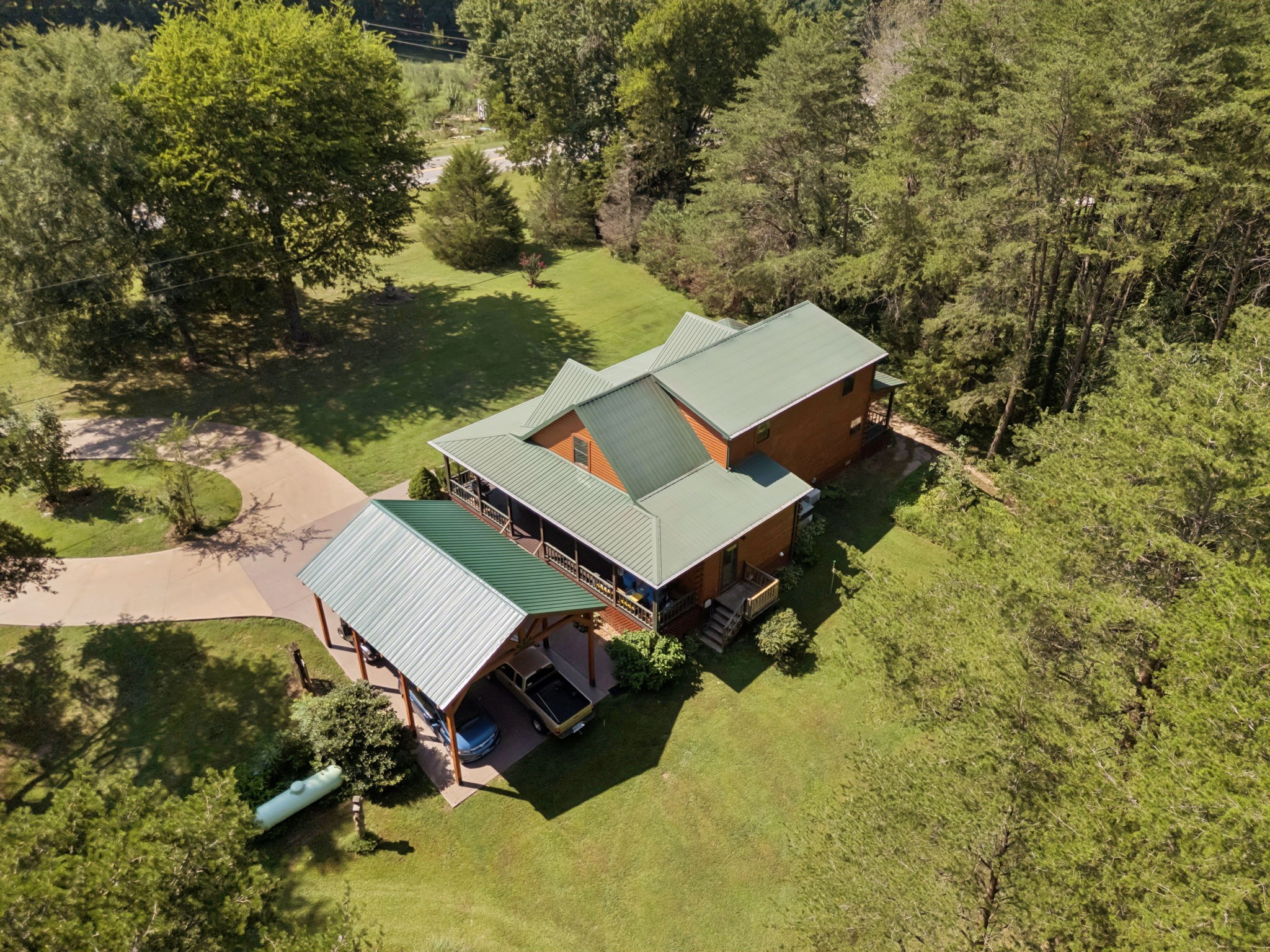602 Gaither Hinson Road Waynesboro, TN 38485 - Photo 49 of 69 an aerial view of a house with yard swimming pool and outdoor seating