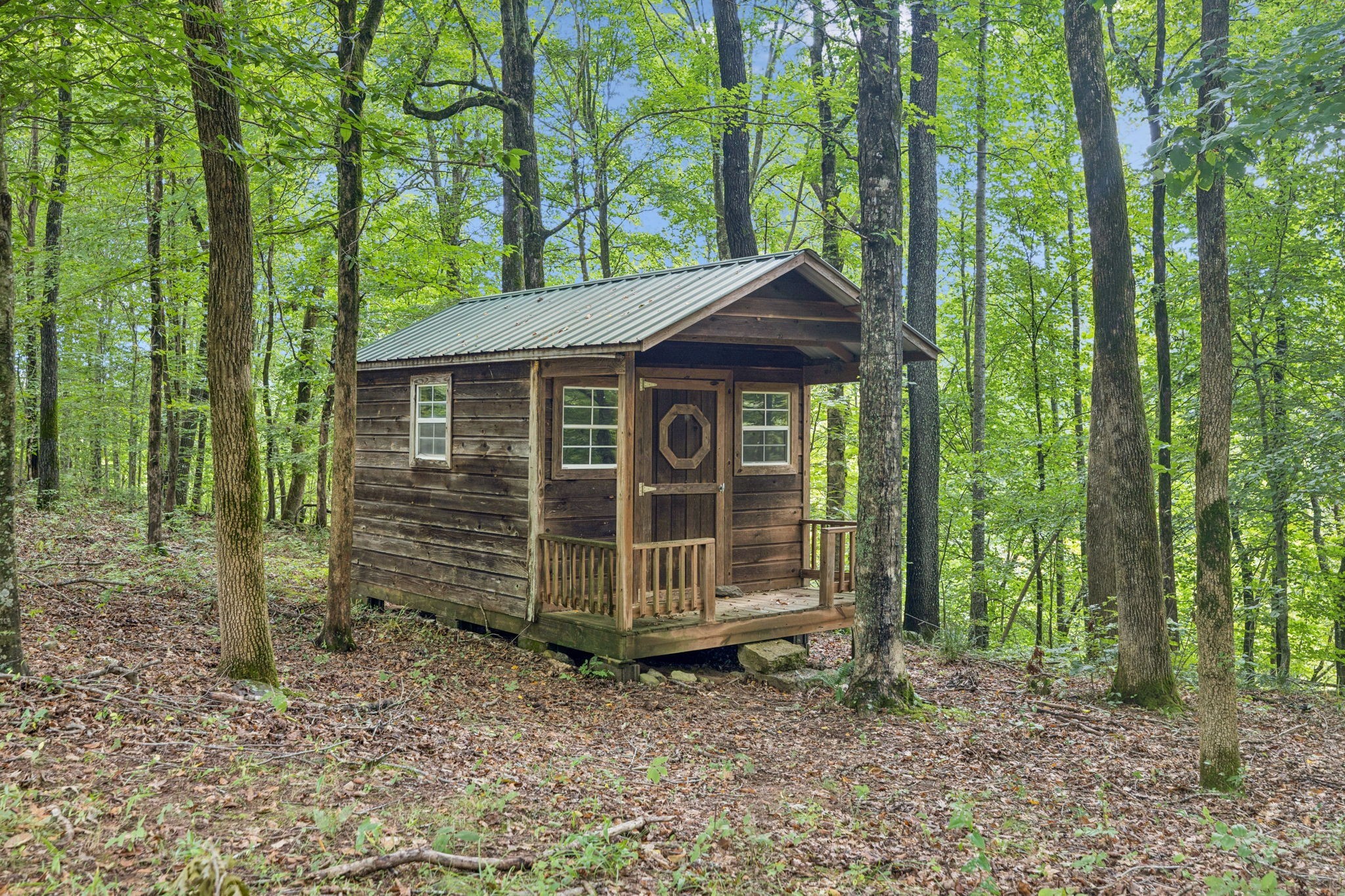 602 Gaither Hinson Road Waynesboro, TN 38485 - Photo 52 of 69 a front view of a house with a garden