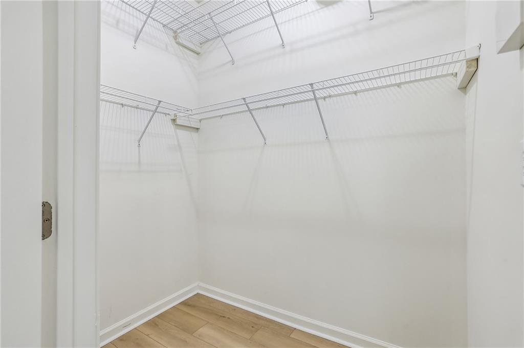5300 Peachtree Road, Unit 3506 Atlanta, GA 30341 - Photo 11 of 25 a view of a room with racks on the wall