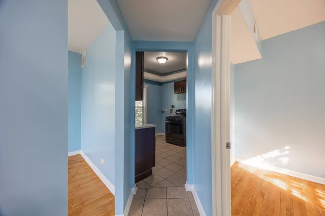 a view of a elevator and an entryway in a hallway