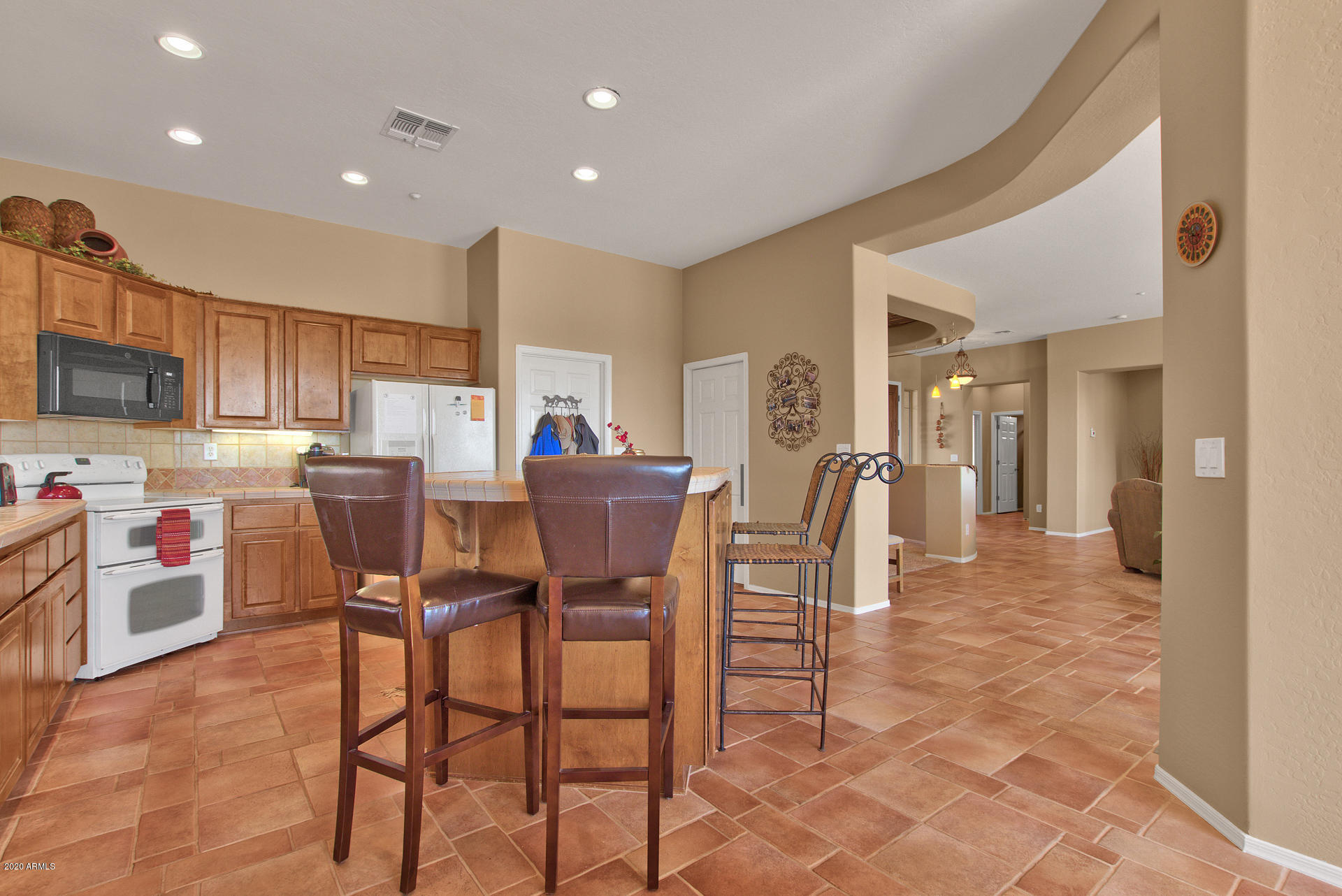 42045 North Crooked Stick Road Anthem, AZ 85086 - Photo 17 of 37 a view of a dining room with furniture