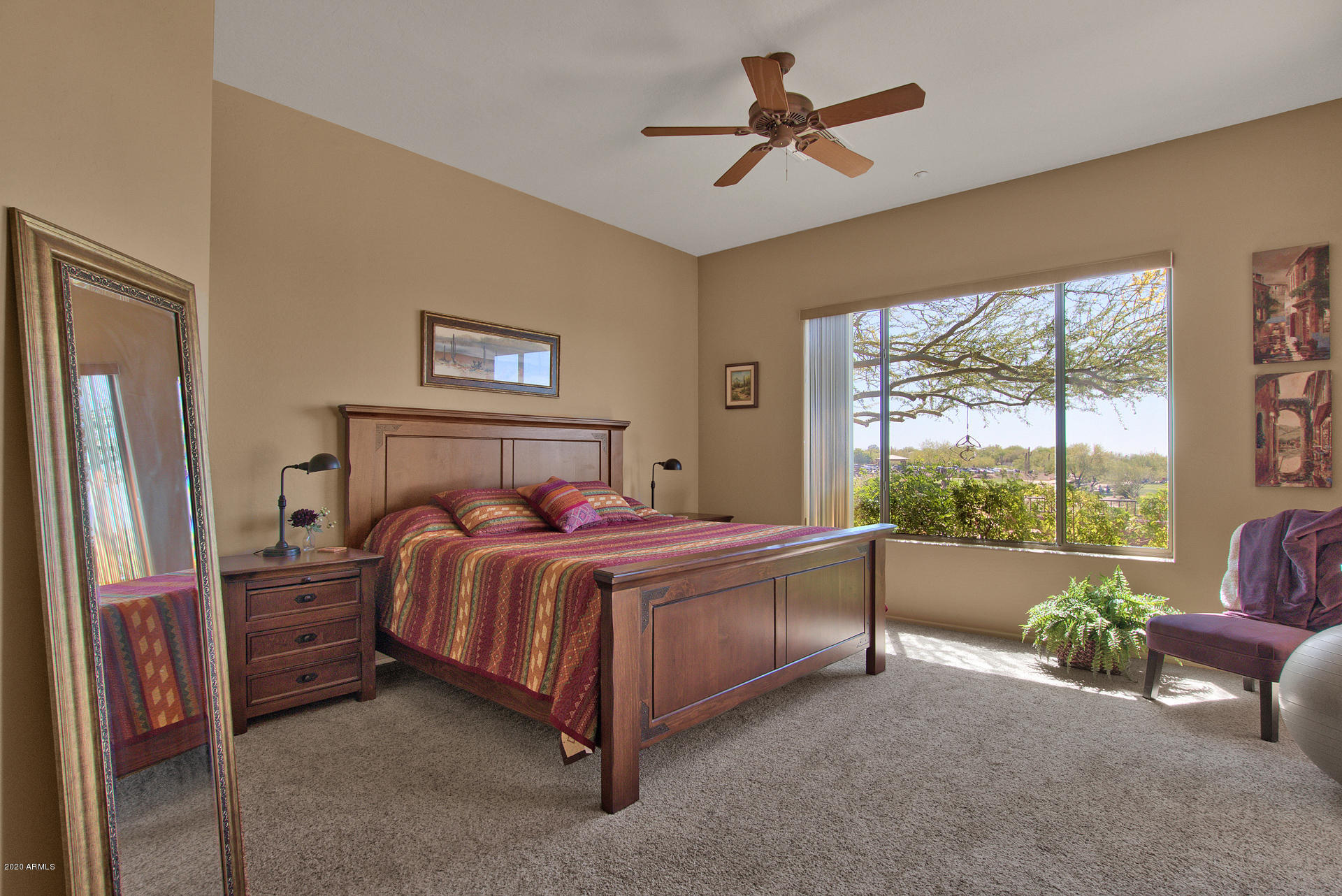 42045 North Crooked Stick Road Anthem, AZ 85086 - Photo 19 of 37 a bed sitting in a room next to a window