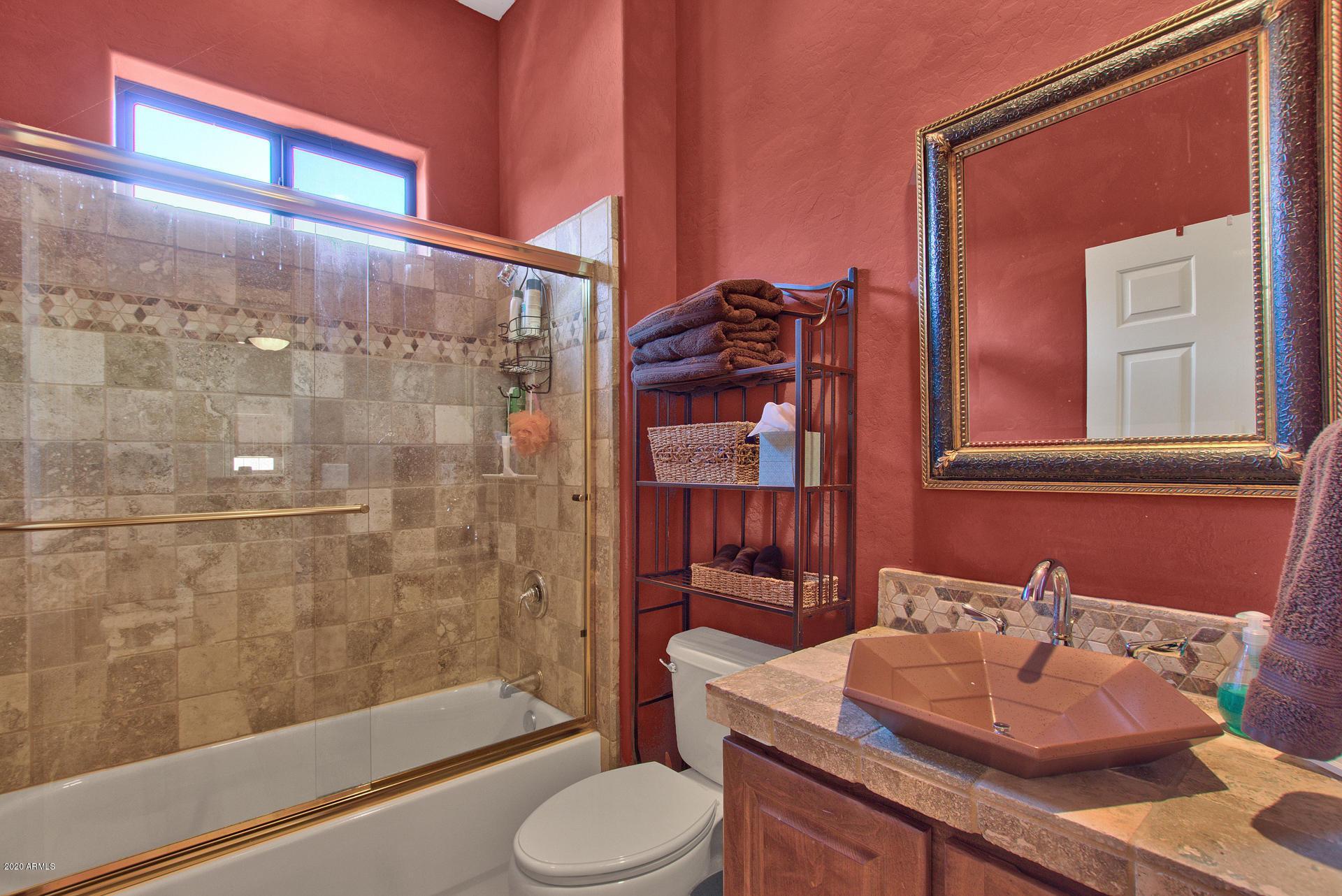 42045 North Crooked Stick Road Anthem, AZ 85086 - Photo 26 of 37 a bathroom with a sink toilet and shower