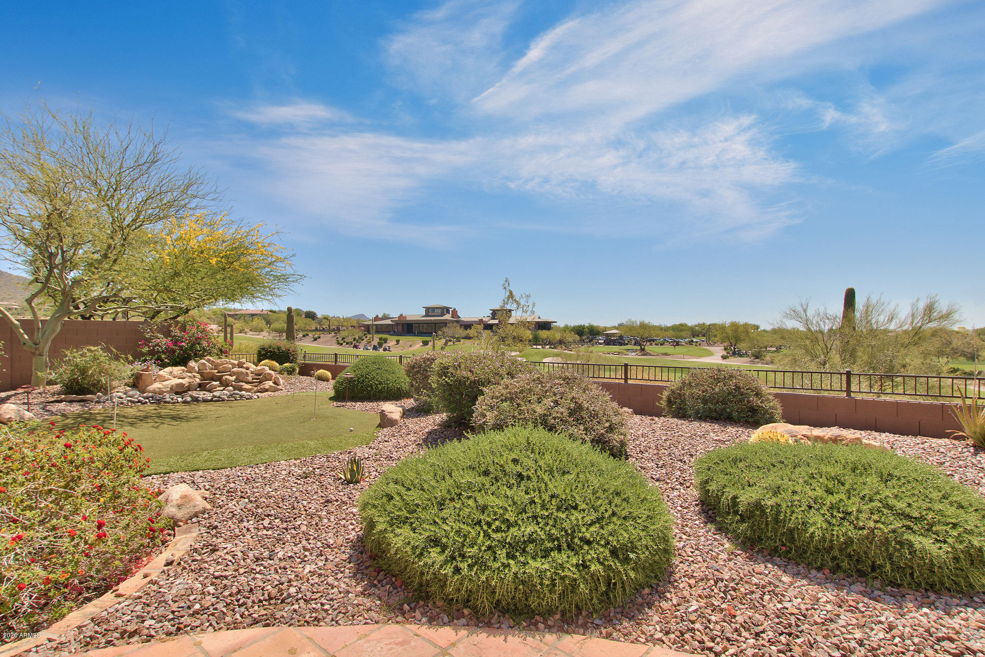 42045 North Crooked Stick Road Anthem, AZ 85086 - Photo 32 of 37 a view of a lake with a yard