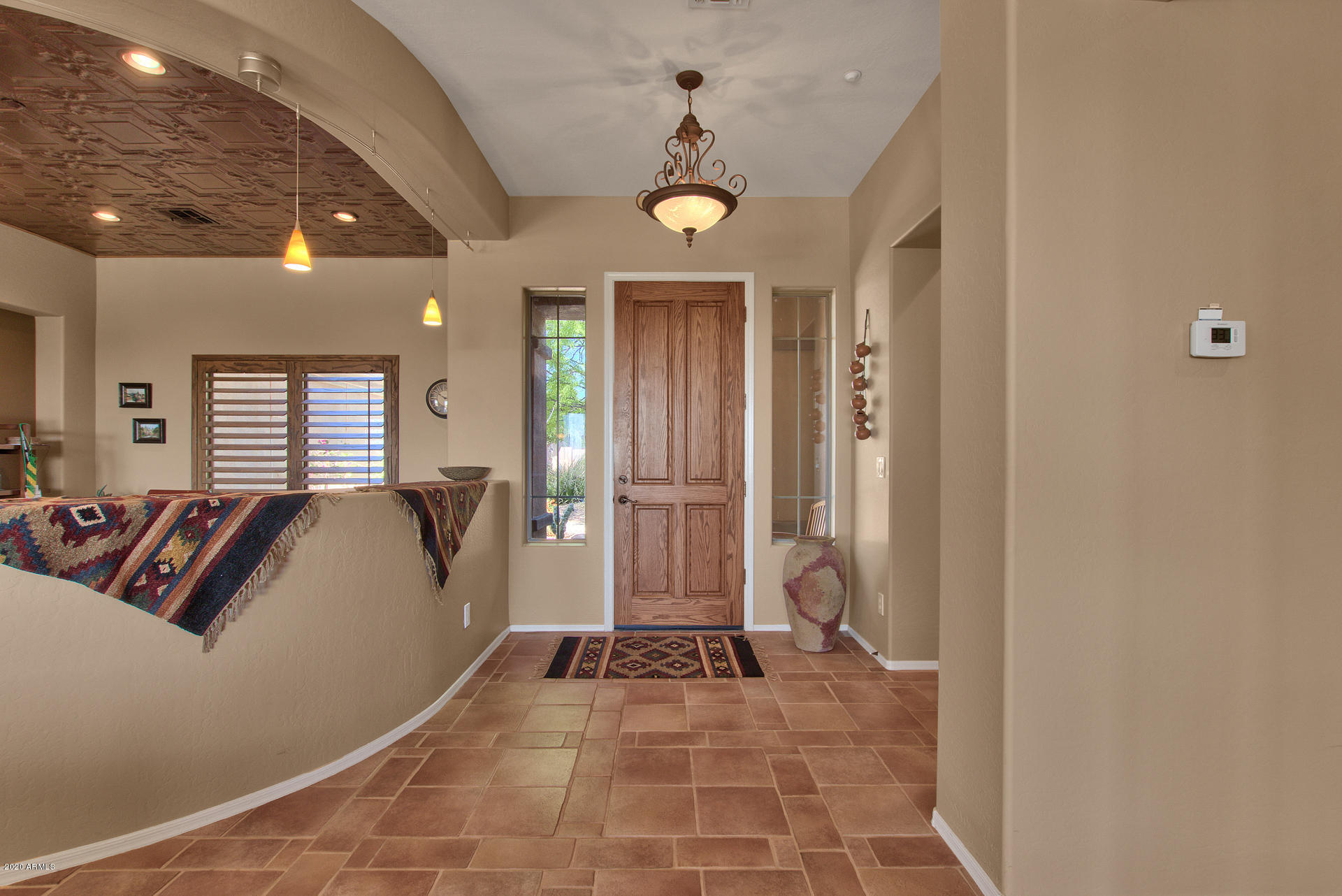 42045 North Crooked Stick Road Anthem, AZ 85086 - Photo 5 of 37 a spacious bathroom with a granite countertop sink a mirror and a shower