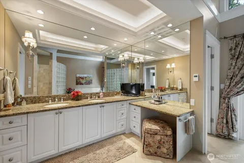 a kitchen with a sink and cabinets