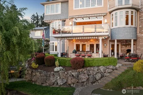 a view of a house with a yard and plants