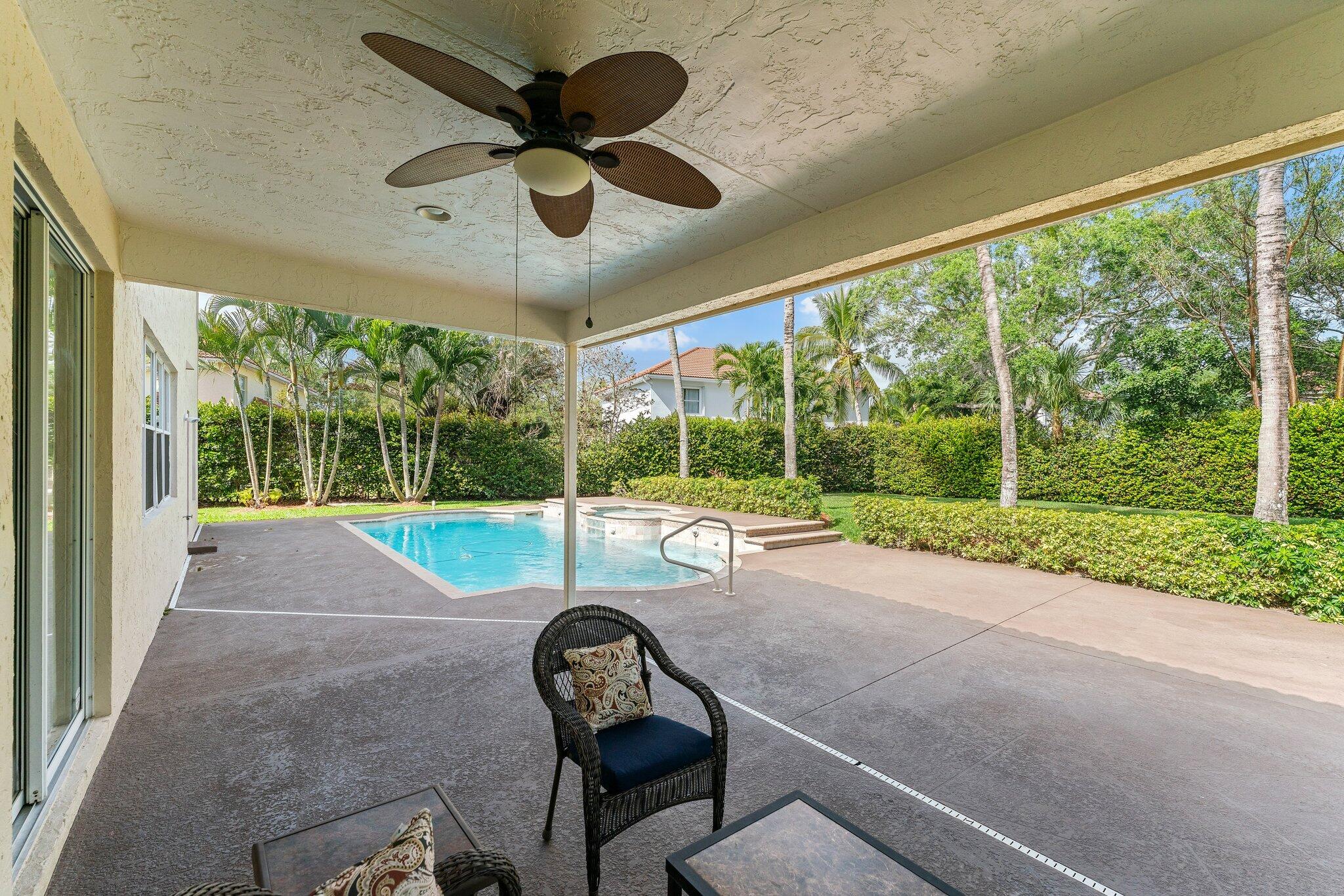 203 Anhinga Lane Jupiter, FL 33458 - Photo 51 of 63 a swimming pool view from a seating space