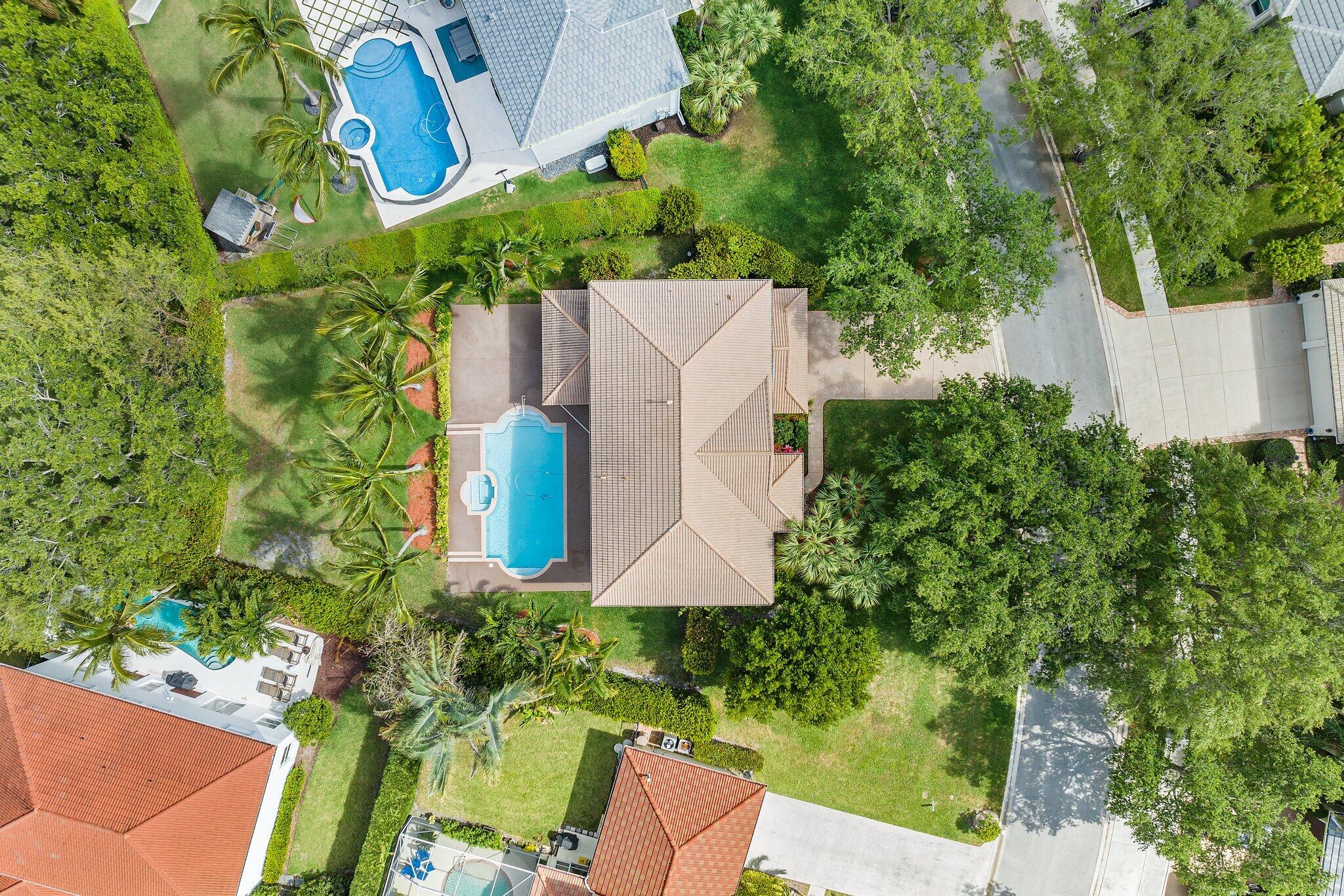 203 Anhinga Lane Jupiter, FL 33458 - Photo 58 of 63 an aerial view of a house