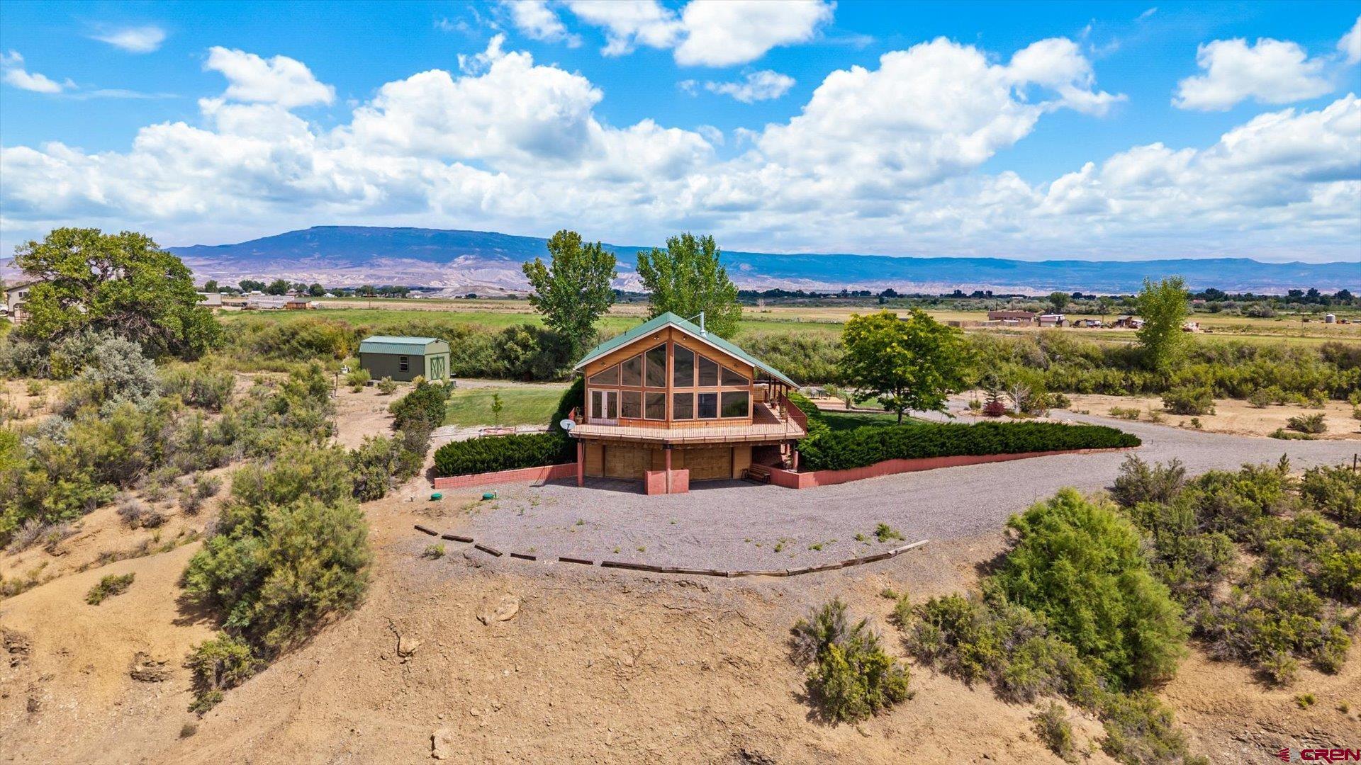 13232 B Road Delta, CO 81416 - Photo 1 of 26 a view of a house with a yard